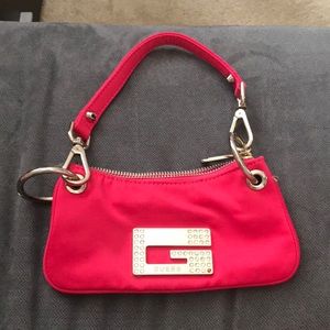 Hot pink guess clutch